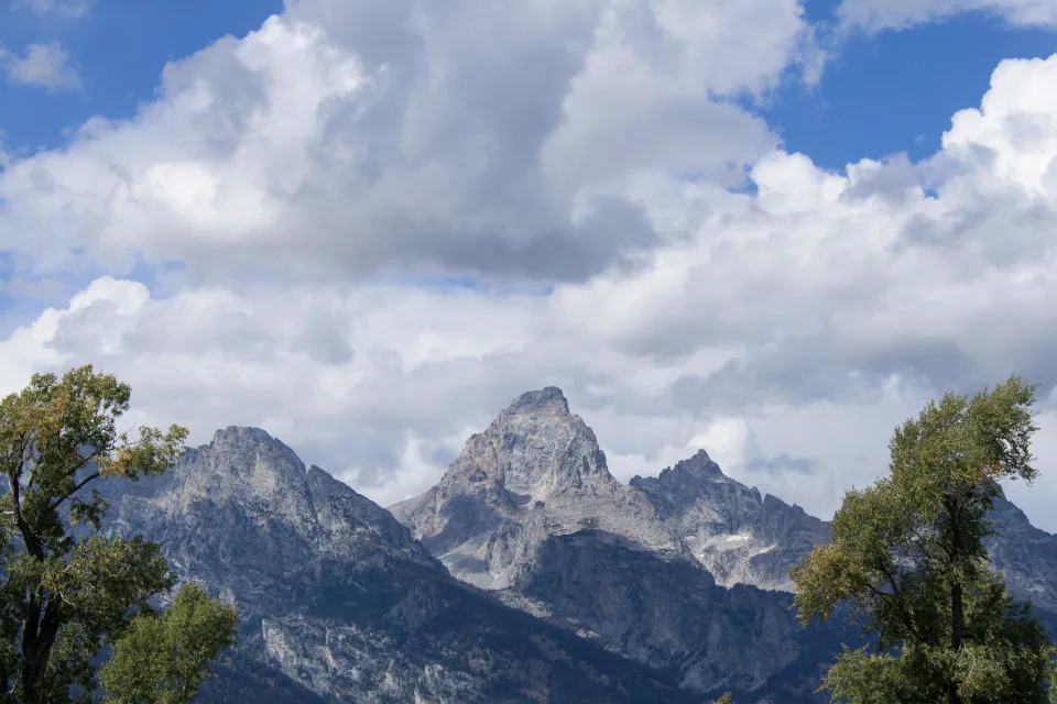 A wide view of the Tetons in clean afternoon light